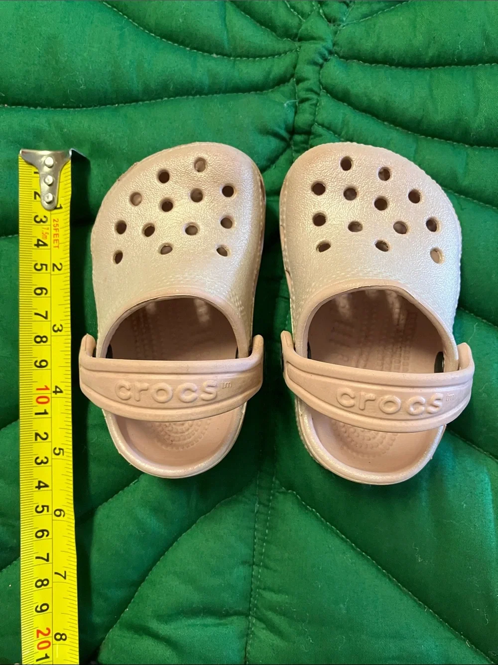 Baby infant crocs size 2/3, shimmer pink color.